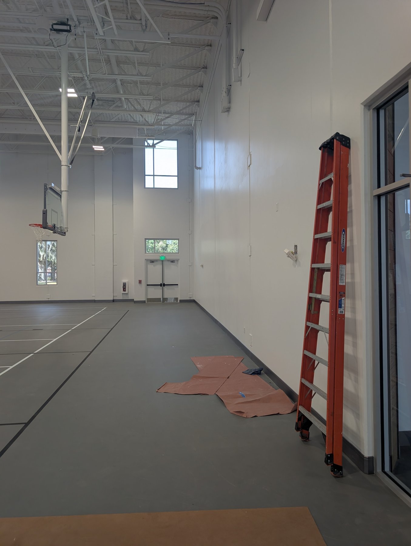 Orchid Cleaning crew's post-construction clean inside the 17,616 sq ft double gymnasium at the Winter Haven Recreation & Cultural Center