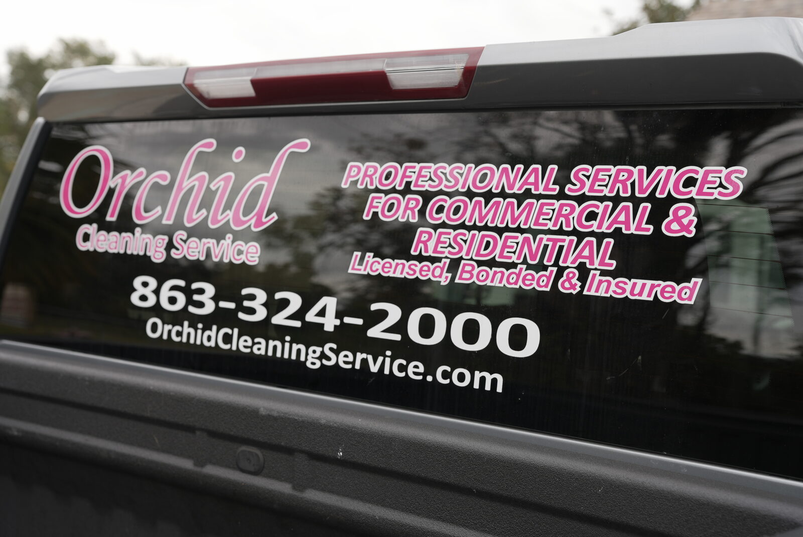 Orchid Cleaning Service company truck branding